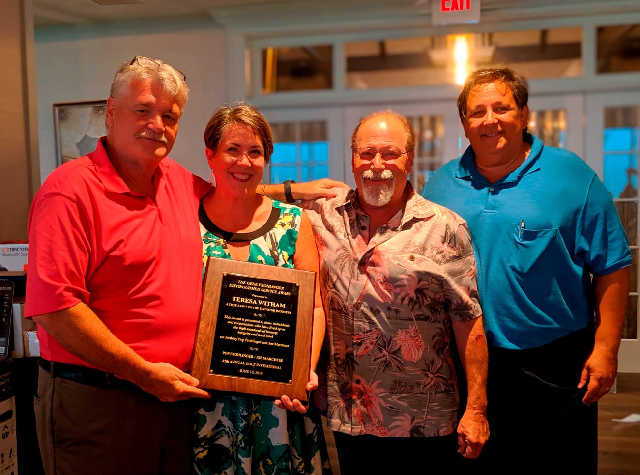 Industry-veteran-honored-at-one-golf-tournament-elevator-company-holds-another