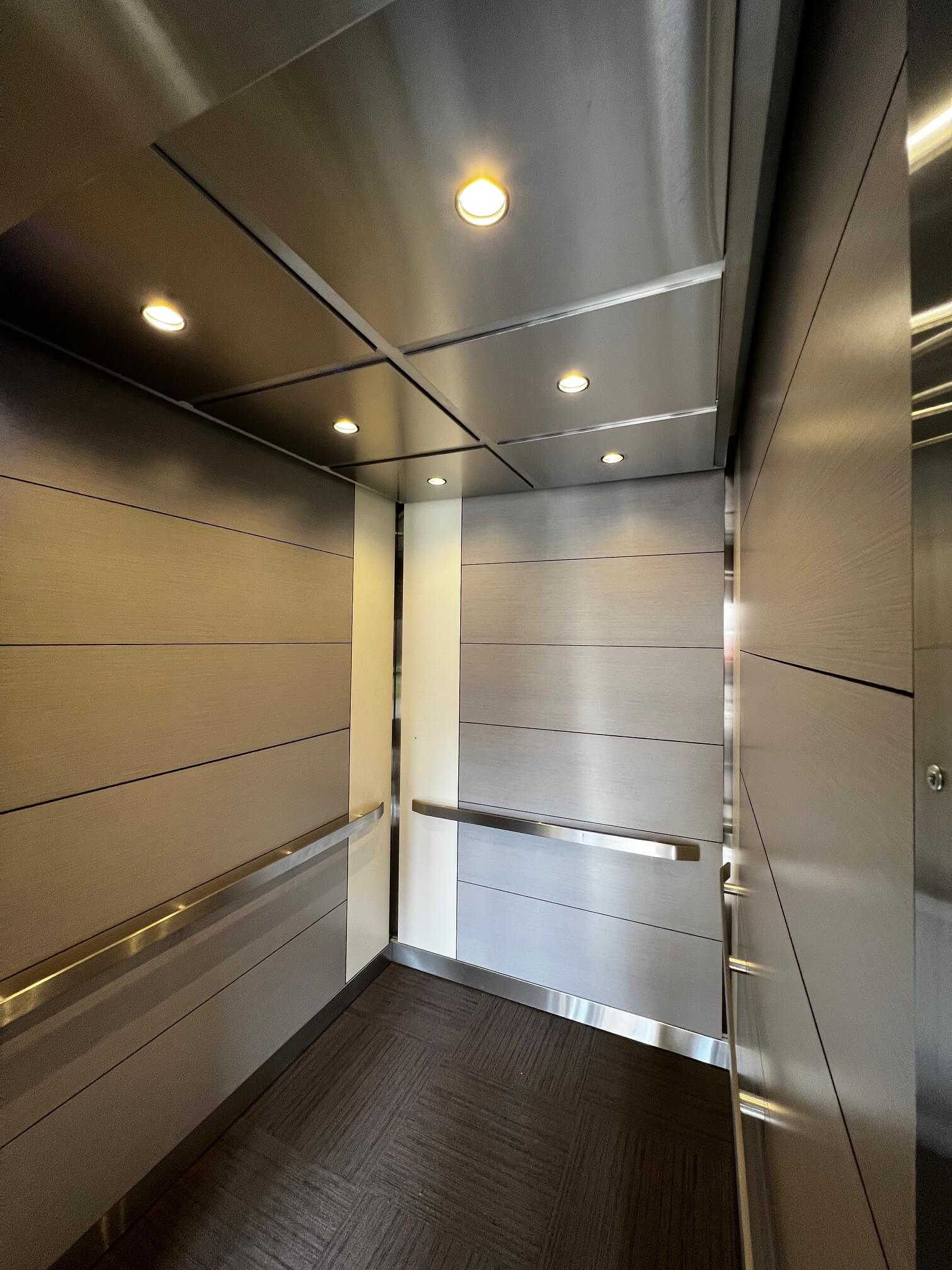 Kankakee Comm College; WilsonArt laminate, stainless steel ceiling, LED downlights, stainless steel handrails and reveals