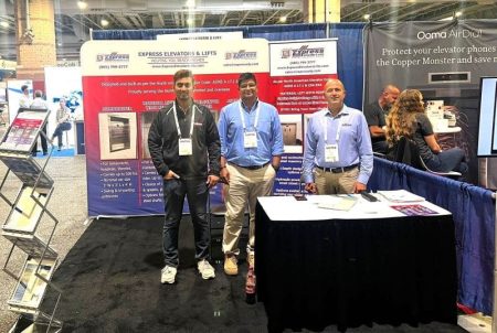 Express Elevators’ booth at NAEC 2024; (l-r) Engineering Manager Zeeshan
Mahmood, Sales Manager Mustafa Khambati, company President Puneet Mehta