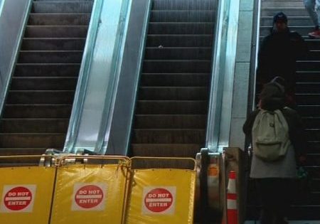 Escalators at the station are out of service; image via CBS News Boston. 