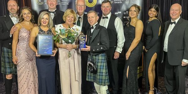 The Renwick family accepts the award; image via The Courier. 