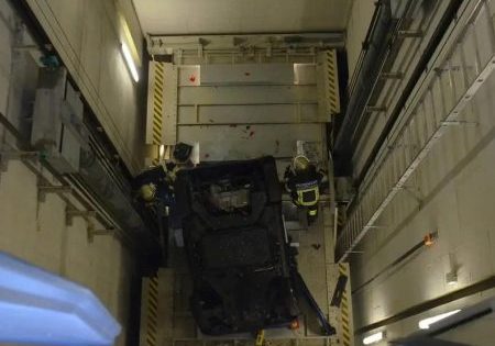 Car and Driver Fall Down German Elevator Shaft