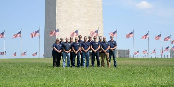 Delaware Elevator employees at the Washington Monument in Washington, D.C.; image courtesy of Delaware Elevator.