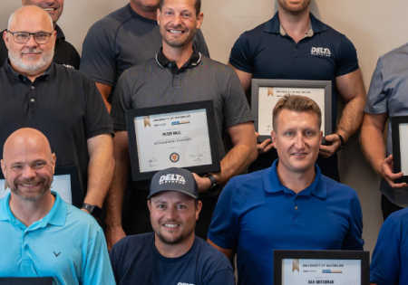 Delta Elevator staff with their certificates of completion; image courtesy of University of Waterloo