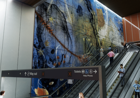 Escalators and public art at the new Roma Street underground station; image courtesy of Cross River Rail