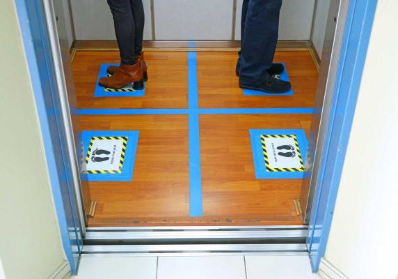 Elevator Usage Instructions in the Framework of COVID-19
