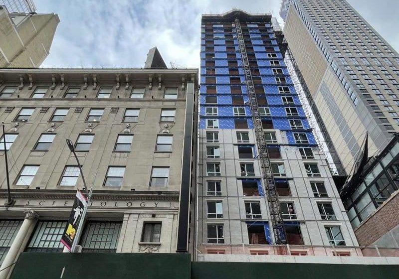 Exterior Walls of Times Square Hotel Rising