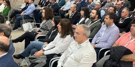 Attendees listen to a presentation; image courtesy of Fermator.