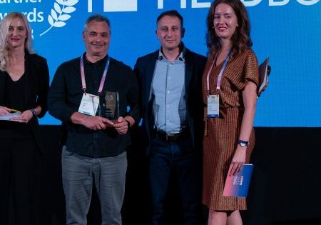 FIELDBOSS CEO Jonathan Taub, second from left, accepts the award; photo courtesy of FIELDBOSS.  