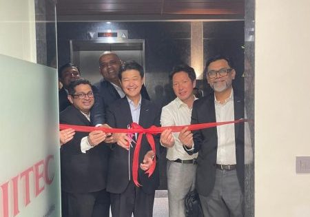 Fujitec India employees cut the ribbon for the new office; image courtesy of Fujitec India via LinkedIn. 