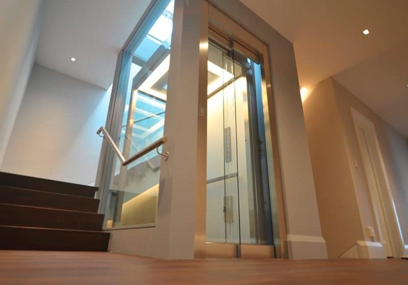 Glass-Elevator-with-Cove-Lighting