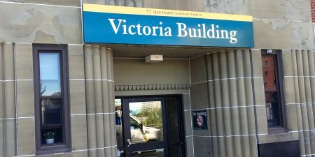 Entrance to the Victoria Building, which was built in 1945; photo by SnowyBadger for Wikipedia