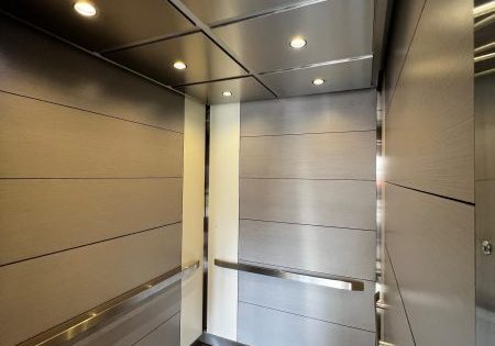 Kankakee Comm College; WilsonArt laminate, stainless steel ceiling, LED downlights, stainless steel handrails and reveals