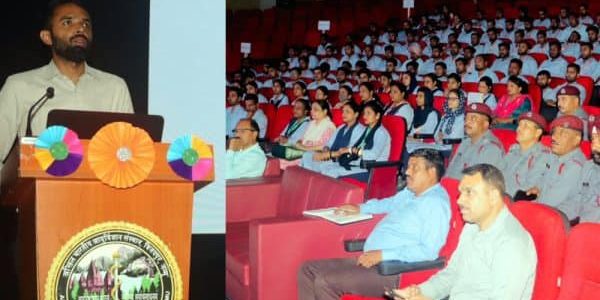 Attendees listen to a presentation; image courtesy of the Daily Excelsior. 