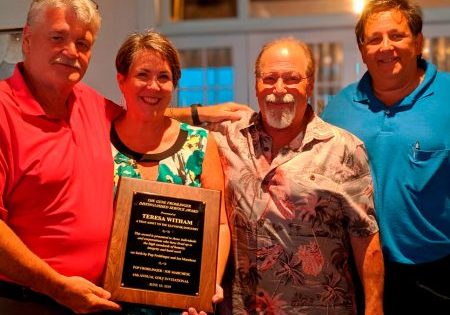 Industry-veteran-honored-at-one-golf-tournament-elevator-company-holds-another