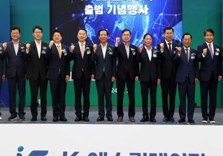 Hyundai Elevator CEO Cho Jae-cheon, eighth from left, poses with participants at the launching ceremony for K-Escalator in Geochang County, South Gyeongsang Province; image courtesy of Hyundai Elevator. 