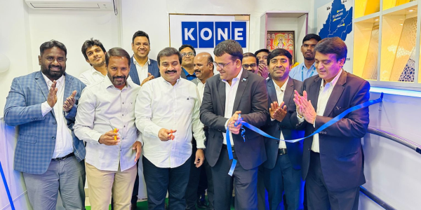 The team inaugurates the new office; image via Passionate in Marketing. 