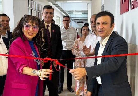 KONE Elevator India & South Asia Managing Director Amit Gossain, right, cuts the ribbon with fellow leaders; image courtesy of KONE. 