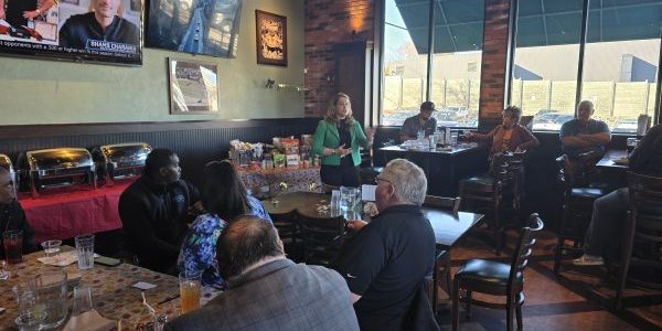 MESA President Director Corinne A. Nawrocki of Abel Elevator Consulting, Inc., speaks during the meeting
