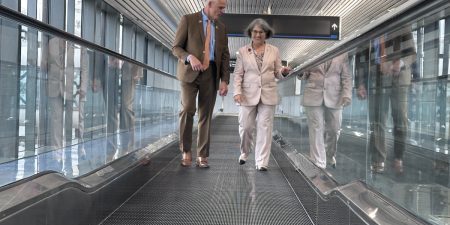 MIA’S NEWEST PAIR OF MOVING WALKS IS 23RD SUCH MODERNIZATION MIA Director and CEO Ralph Cutié and Miami-Dade County Mayor Daniella Levine Cava on MIA's newest moving walk in Concourse D; image courtesy of MIA