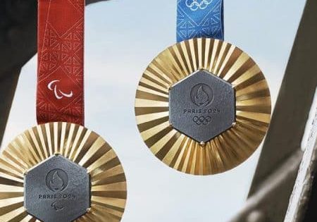 This year's Olympic medals include a hexagonal piece of iron taken from the Eiffel Tower during an elevator modernization. 