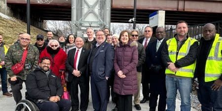 Local and MTA officials and staff join disability rights advocates at a February 22 press conference; photo courtesy of MTA.