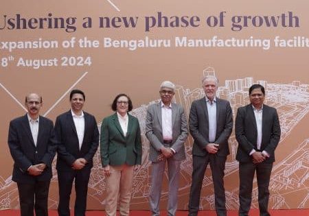 Company leaders, including Otis Chair, CEO and President Judy Marks and Otis India President Sebi Joseph, third and fourth from left, celebrate the expansion news with colleagues; image courtesy of Otis.