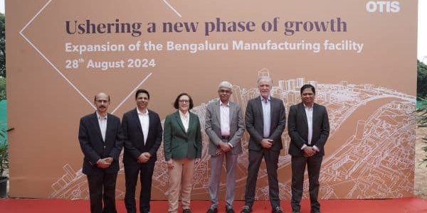 Company leaders, including Otis Chair, CEO and President Judy Marks and Otis India President Sebi Joseph, third and fourth from left, celebrate the expansion news with colleagues; image courtesy of Otis.