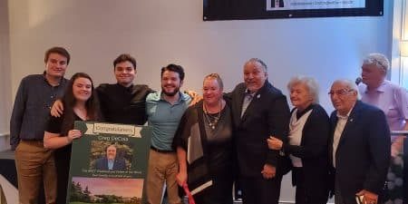 Greg DeCola, fourth from right, accepts the honor with his family by his side; photo by EW Correspondent Matthew Jackson