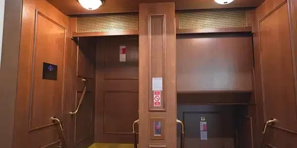 The early 20th-century paternoster at Prague City Hall has 12 compartments and was designed by John Prokopec; image via a YouTube screengrab via expats.cz.