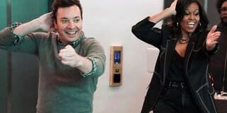 Jimmy Fallon and Michelle Obama bust a move in front of surprised elevator riders; image courtesy of NBC. 