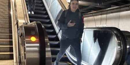 Riders enjoy the new escalators; image courtesy of BART.