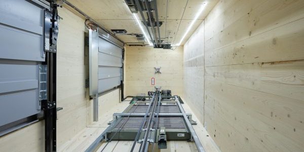 Elevators were installed in wooden shafts using a certified, high-efficiency assembly method; image courtesy of Schindler. 