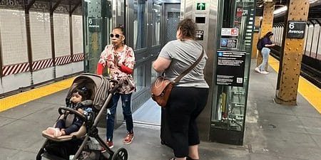 Subway riders take advantage of the brand-new elevator system; photo by Ray Raimundi for MTA.