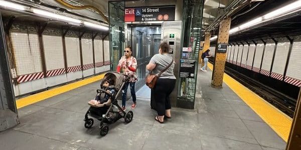 Subway riders take advantage of the brand-new elevator system; photo by Ray Raimundi for MTA.