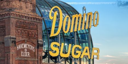 A replica Domino Sugar sign evokes the past; image courtesy of The Refinery at Domino. 