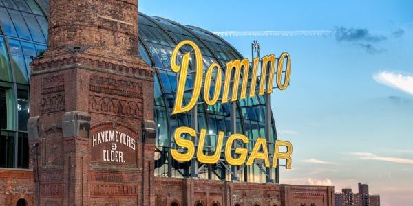 A replica Domino Sugar sign evokes the past; image courtesy of The Refinery at Domino. 