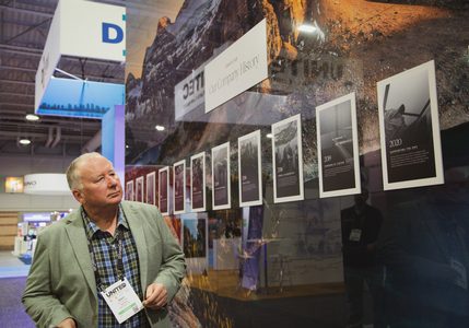 Bostock checks out the award-winning booth at NAEC 2024