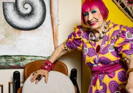 Dame Zandra Rhodes with her Stannah 158 stairlift; image courtesy of Stannah