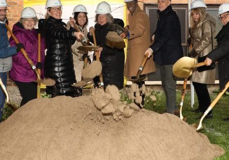 A groundbreaking ceremony took place on April 3 to kick off installation of the new elevator at the DeSales Center. (l-r) are DeSales Center board members Mary Ellen Luker and Matt Grove, Board President Ellen Luley, Empire State Development Mohawk Valley Regional Director Allison Madmoune, Adirondack Bank Vice President of Commercial Lending Ann Gaworecki, Thea Bowman House Executive Director Jane Domingue, Thea Bowman House alumni/board member Julius Blackshear, Jr., Oneida County Executive Anthony J. Picente Jr., Rosemary Bonacci, Roann Destito and Thea Bowman House board member/treasurer William Taft; image courtesy of Thea Bowman House via The Central New York Business Journal. 