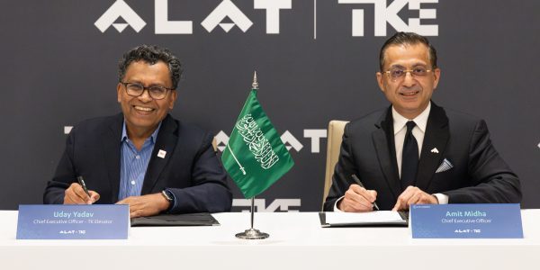 (l-r) TKE CEO Uday Yadav and Alat CEO Amit Midha sign the agreement.