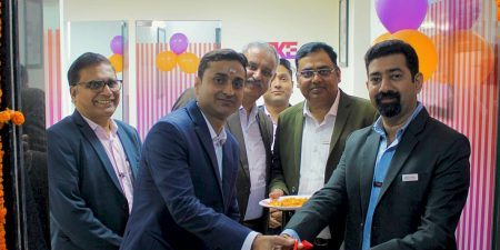 TKE India CEO and MD Manish Mehan, right, cuts the ribbon on the new office with local leaders; image courtesy of TKE India.