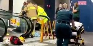 Woman Stuck, Injured in Fall on Escalator