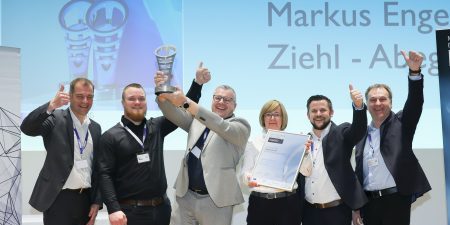 (l-r) Industrial Engineering Technologist Max Borek, Head of the Electronics Plant Marcus Engel, Head of Global Audits Sandra Kallausch, Head of Logsitics, Electronics and Plant Matthias Hofmann and Head of Quality Management, Electronics Division Markus Frankenback at the Berlin awards ceremony; photo by Marcus Krueger